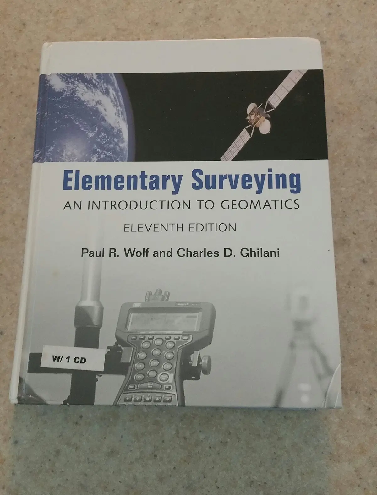 Elementary Surveying: An Introduction To Geomatics Wolf, Paul R. And Ghilani, Charles D., Ph.D. 1